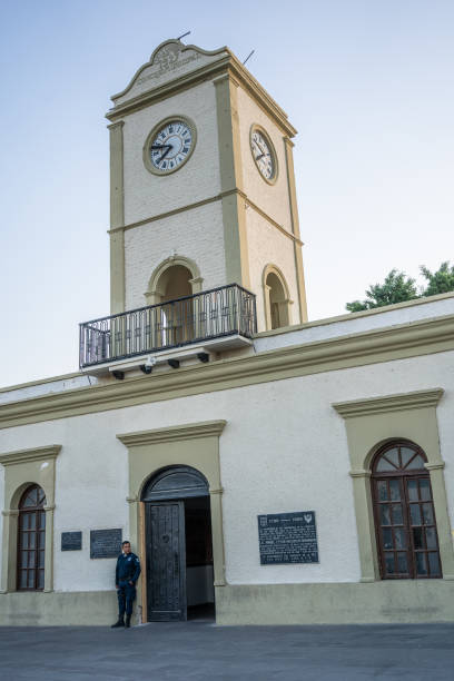 Palacio Municipal - Municipal palace entrance and clock tower with guard on duty in San Jose del Cabo, Baja Sur, Mexico stock photo