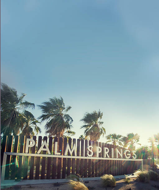 Palm Springs Welcome sign Palm Springs Welcome sign blue sky copy space palm springs california stock pictures, royalty-free photos & images