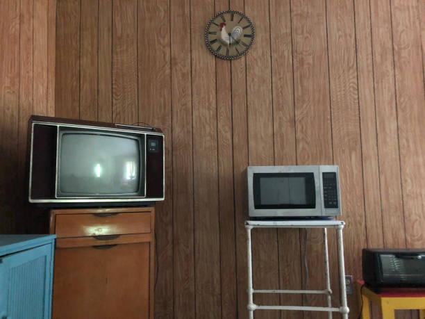 Paneled Room with a Television, Microwaves an Toaster Oven stock photo