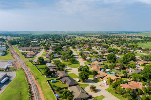 Panorama landscape scenic aerial view of a suburban settlement in a beautiful detached houses the Clinton town Oklahoma USA stock photo