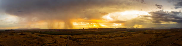 A panorama of a monsoon at sunset stock photo