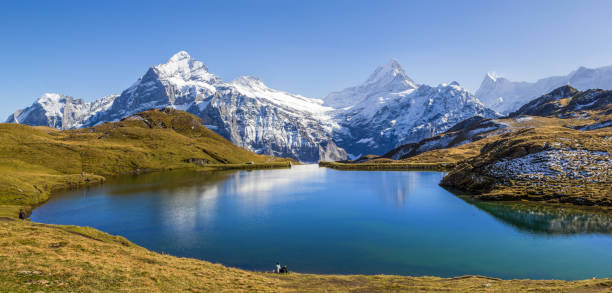 Panorama of Bachalpsee at the First peak over Grindelwald stock photo