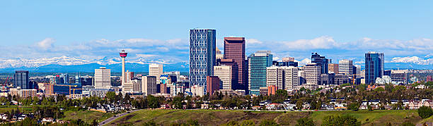 Panorama of Calgary and Rocky Mountains stock photo
