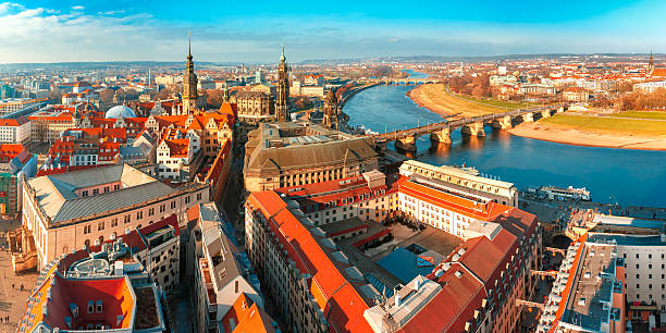 Panorama of Old town and Elbe, Dresden, Germany Aerial scenic panorama of the Old Town of Dresden: river Elbe with Augustus Bridge, Hofkirche and Royal Palace, Saxony, Germany dresden germany stock pictures, royalty-free photos & images
