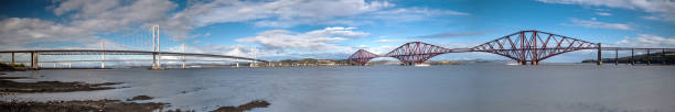 Panorama of Queensferry Crossing, Forth Road Bridge and Forth Bridge stock photo