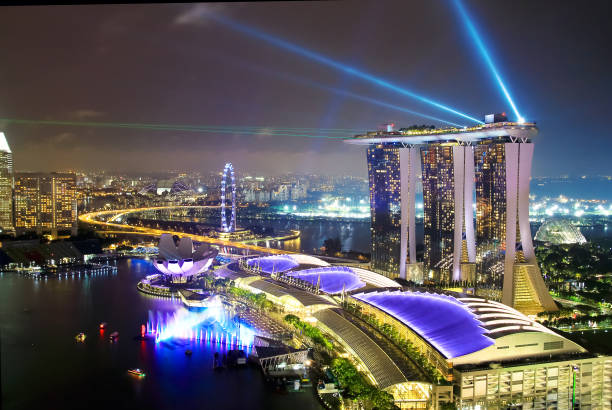 Panorama of Singapore city skyline at night, aerial view. stock photo