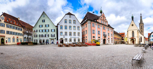 Panorama of the marketsquare in Rottenburg am Neckar Rottenburg am Neckar  is a medium-sized town in the administrative district  of Tübingen in Baden-Württemberg, Germany. Rottenburg is the seat of a Roman Catholic bishop, being the official centre of the diocese of Rottenburg-Stuttgart. rottenburg am neckar stock pictures, royalty-free photos & images