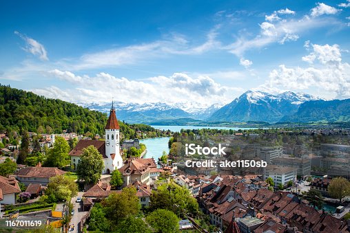 istock Panorama of Thun city  in the canton of Bern with Alps and Thunersee lake, Switzerland. 1167011619