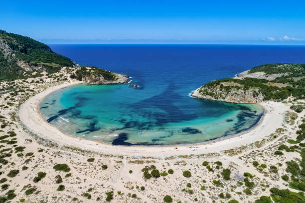 Panoramic aerial view of voidokilia beach, one of the best beaches in mediterranean Europe, beautiful lagoon of Voidokilia from a high point of view, Messinia, Greece stock photo