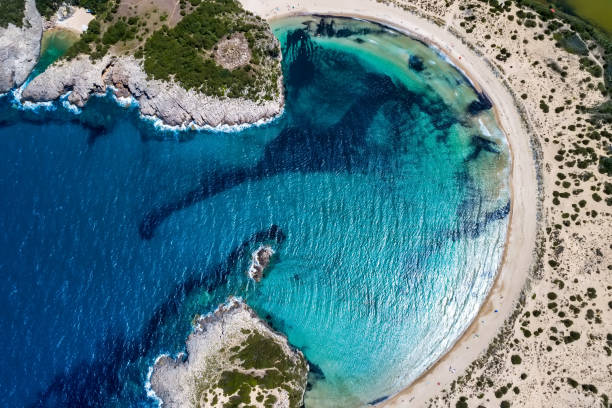 Panoramic aerial view of voidokilia beach, one of the best beaches in mediterranean Europe, beautiful lagoon of Voidokilia from a high point of view, Messinia, Greece stock photo