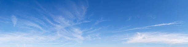 Panoramic blue sky with light clouds Panoramic sky on a sunny day. wide stock pictures, royalty-free photos & images