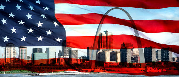 Panoramic photograph of American flag double exposure over St Louis Missouri skyline Gateway Arch stock photo