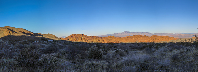 Panoramic picture of deep red colored rock formations in the Valley of Fire state park near Las Vegas