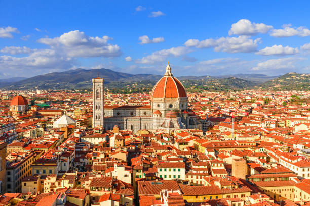 Panoramic view of Florence and Santa Maria del Fiore Duomo in Florence, Italy Panoramic view of Florence and Santa Maria del Fiore Duomo in Florence, Italy with orange rooftops duomo santa maria del fiore stock pictures, royalty-free photos & images