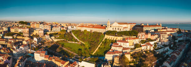 Panoramic view of Lisbon; old yellow rooftops in Portuguese capital stock photo