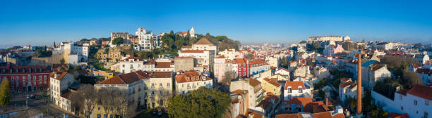 Panoramic view of Lisbon; old yellow rooftops in Portuguese capital stock photo