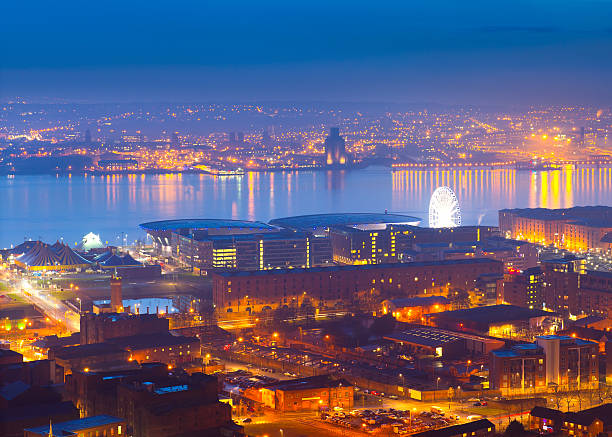 Panoramic view of Liverpool City at night Panoramic view of Liverpool City at night, England, UK. the wirral stock pictures, royalty-free photos & images
