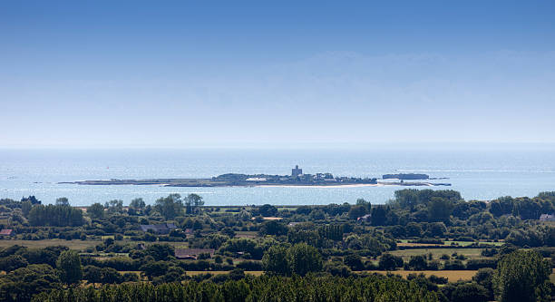 Panoramic View of Peninsula Cotentin in Basse Normandy, France Panoramic View of Peninsula Cotentin in Basse Normandy, France - In the distance the island Tatihou near Saint-Vaast-la-Hougue, Basse Normandy, France manche stock pictures, royalty-free photos & images