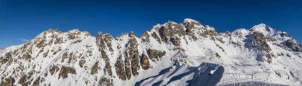 Panoramic view of rocky mountains peaks in Tetnuldi ski resort stock photo