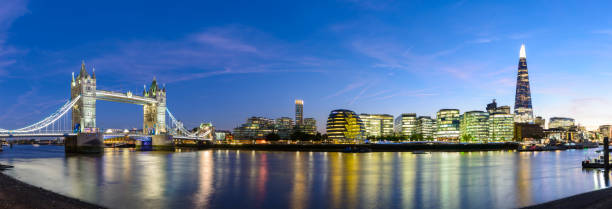 Panoramic View of the River Thames with Tower Bridge and the London City Skyline stock photo