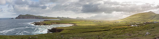 Panoramic View of Western Coast of Dingle Peninsula, Ireland Panoramic View of the western coast of Dingle Peninsula, Ireland. The early  dingle peninsula stock pictures, royalty-free photos & images