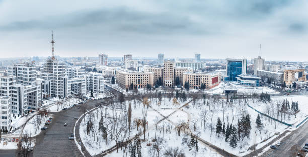 panoramic view on ukrainian city kharkiv and one of the greatest squares in europe - freedom square. world unesco heritage list architecture. beautiful winter snowy urban skyline scenery. aerial view. - kharkiv imagens e fotografias de stock