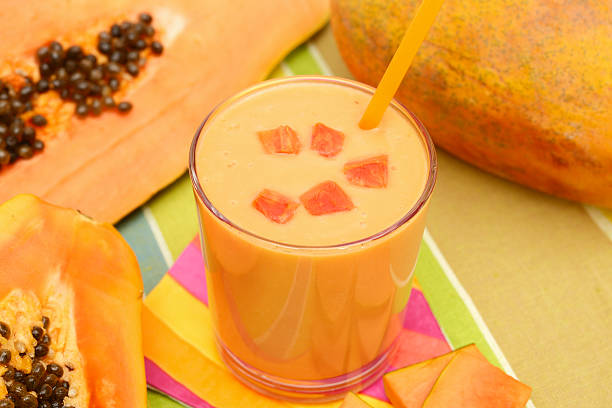 Papaya smoothie Fresh papaya smoothie papaya smoothie stock pictures, royalty-free photos & images