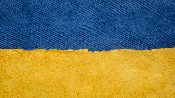 paper abstract in colors of Ukrainian national flag stock photo