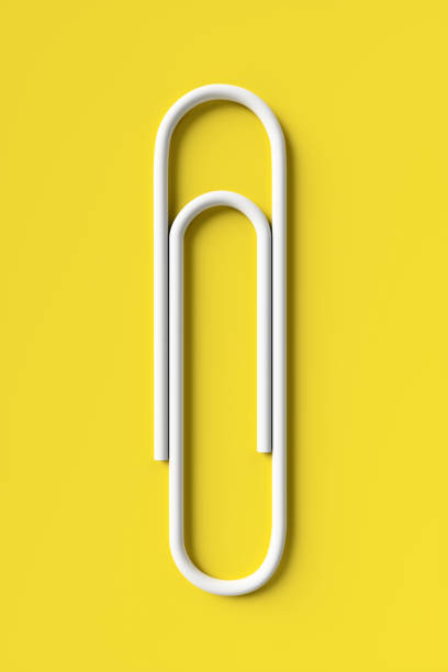 Paper clip on a yellow background. 3d rendering illustration. stock photo