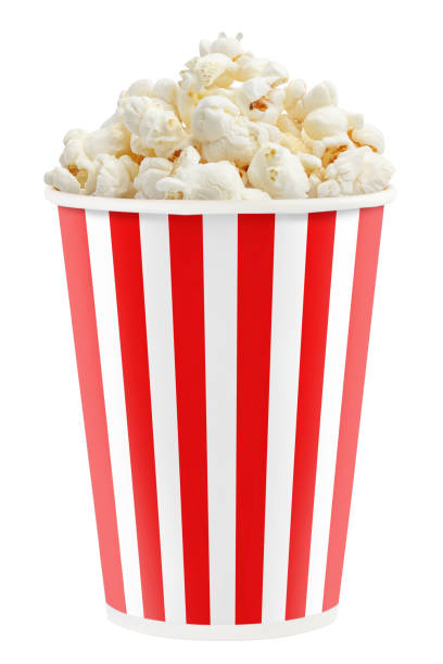 Paper cup with a popcorn on white Delicious popcorn in a red striped paper cup, isolated on white background popcorn stock pictures, royalty-free photos & images