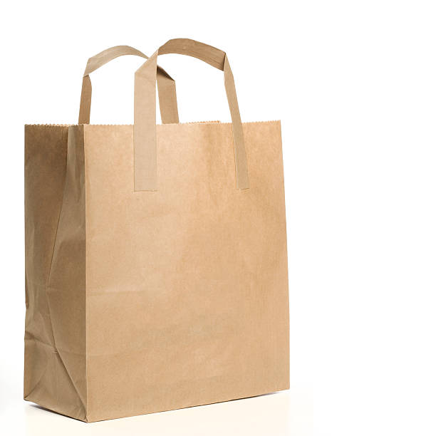 paper shopping bag on white background - brown paper bag bildbanksfoton och bilder