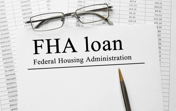 Paper with FHA loan on a table stock photo