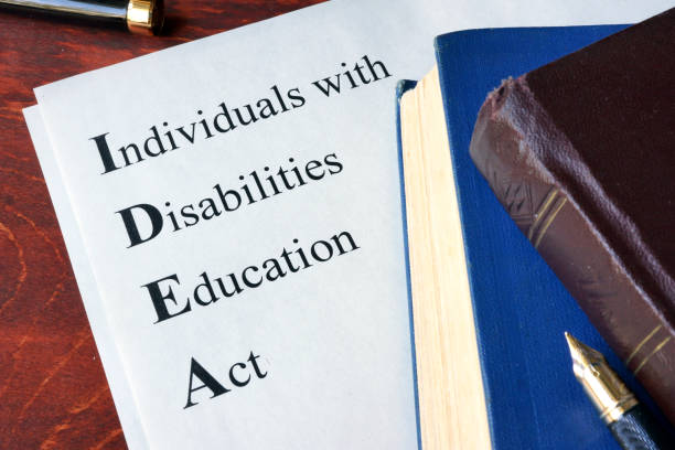 papier met titel personen met een handicap education act (idee) - acteren stockfoto's en -beelden