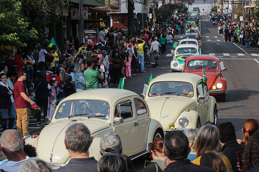 Apucarana, Paraná, Brazil - September 07, 2022 - Parade of Vintage Cars, like the Beetle, on the Independence Day of Brazil