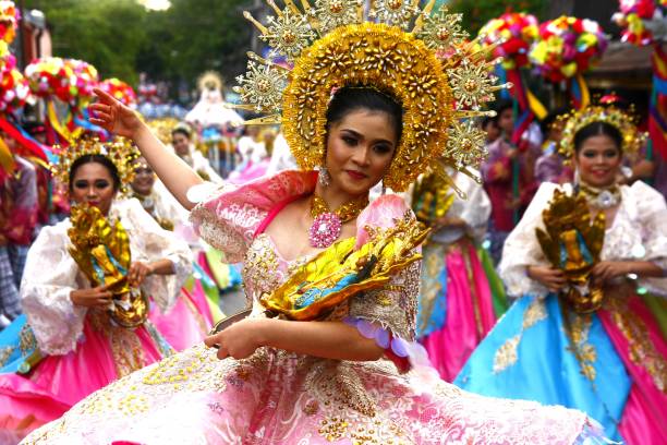 Parade participants in their colorful costumes stock photo