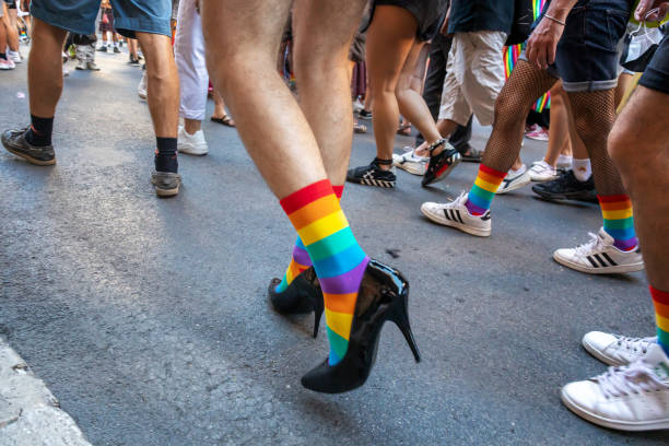 Parade with music and dancing at the Rome gay pride in Italy. stock photo