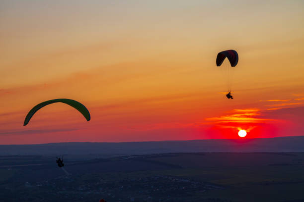 Paragliders and sunset. Mineralnye Vody resort. Russia stock photo