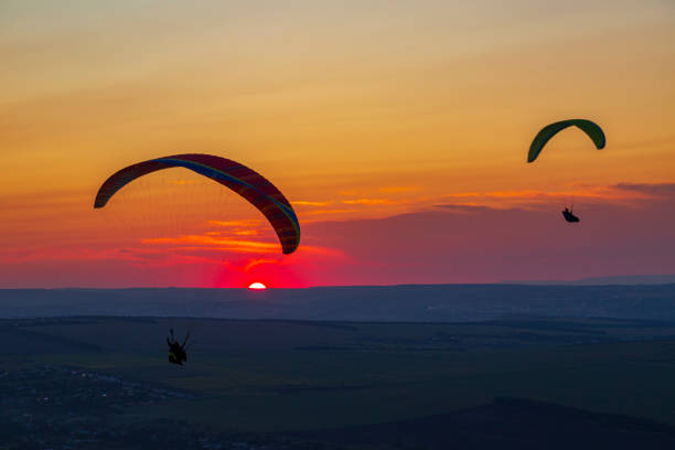 Paragliders and sunset. Mineralnye Vody resort. Russia stock photo