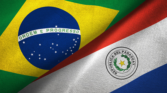 Paraguay And Brazil Two Flags Together Realations Textile Cloth Fabric  Texture Stock Photo - Download Image Now - iStock