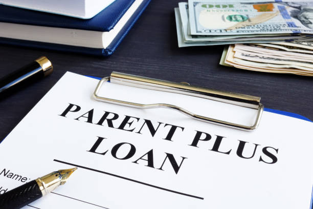 Parent plus loan form and documents in the office. Parent plus loan form and documents in the office. plus computer key photos stock pictures, royalty-free photos & images