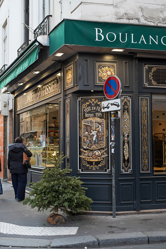 Paris, France - January 14 2022: Bakery Le Fournil de Guillaume in Paris. Parisian bakery on a cloudy winter day.