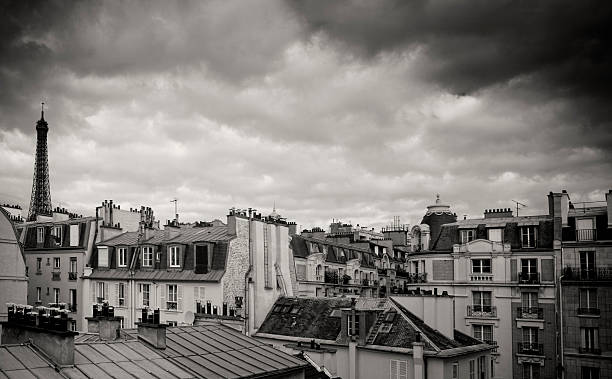 Paris roofs with Eiffel tower in black and white stock photo