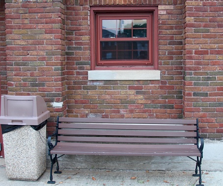 Park Bench Up Against The Building Stock Photo Download Image