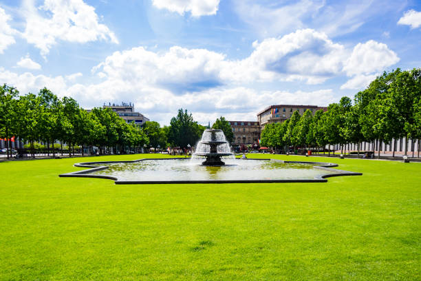 Park with Fountain Wiesbaden, Germany - 2018-06-03: Park with lawn and Fountain in Wiesbaden hesse germany stock pictures, royalty-free photos & images