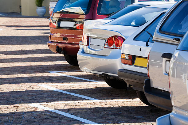 Parked cars, long shadows  medium group of objects stock pictures, royalty-free photos & images