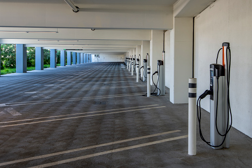 Parking garage with electrical charging stations.