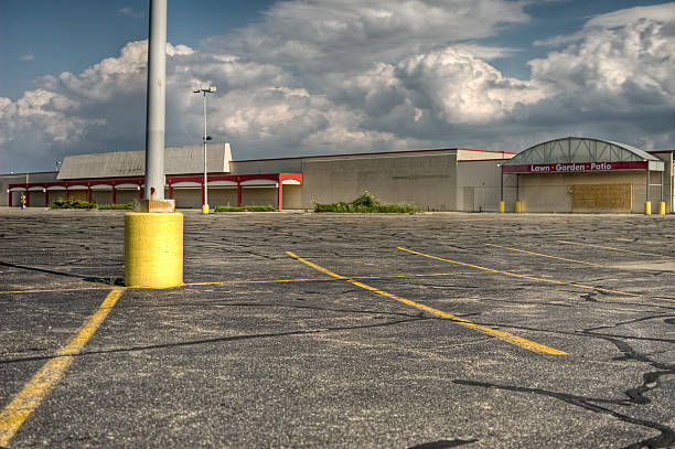 Parking lot in front of a big commercial store property stock photo