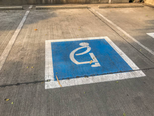 parking-zone-for-disable-pregnant-old-people-picture-id654767046