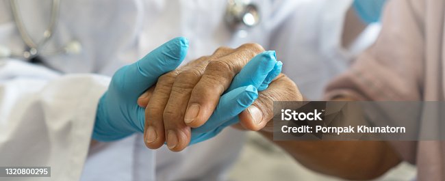 istock Parkinson and alzheimer female senior elderly patient with physician doctor in hospice care. 1320800295