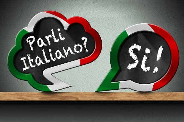 Parli Italiano and Si - Two Speech Bubbles on a Wooden Shelf stock photo